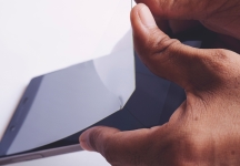 Testing method for screen protector adhesiveness